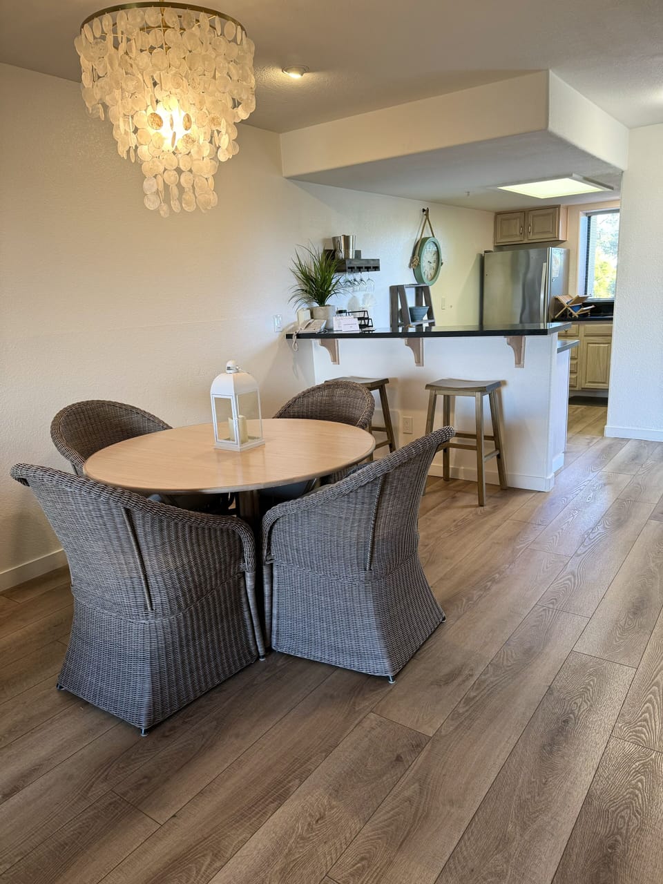 dining table, bar stools, looking toward kitchen