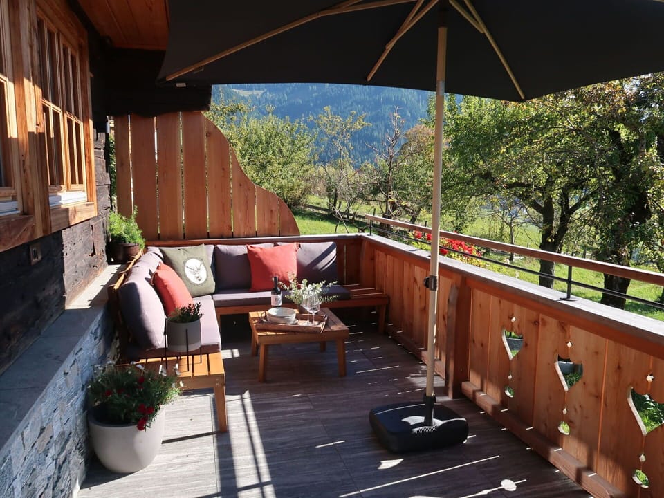 Plant, Building, Flowerpot, Shade, Wood, Houseplant, Interior Design, Tree, Outdoor Furniture, Chair