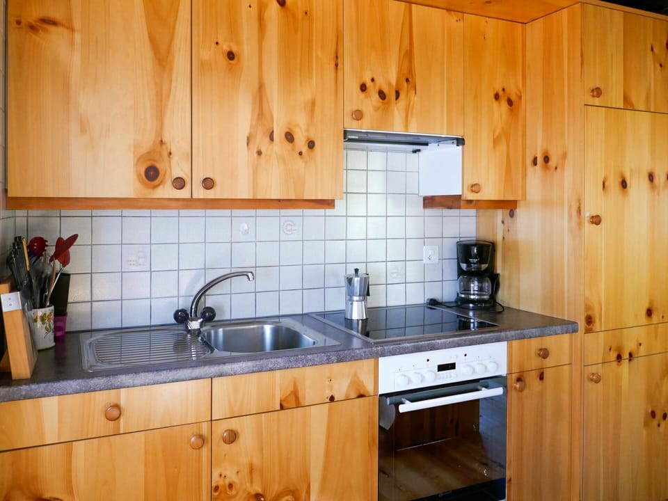 Brown, Countertop, Cabinetry, Kitchen Sink, Tap, Building, Property, Sink, Kitchen, Wood