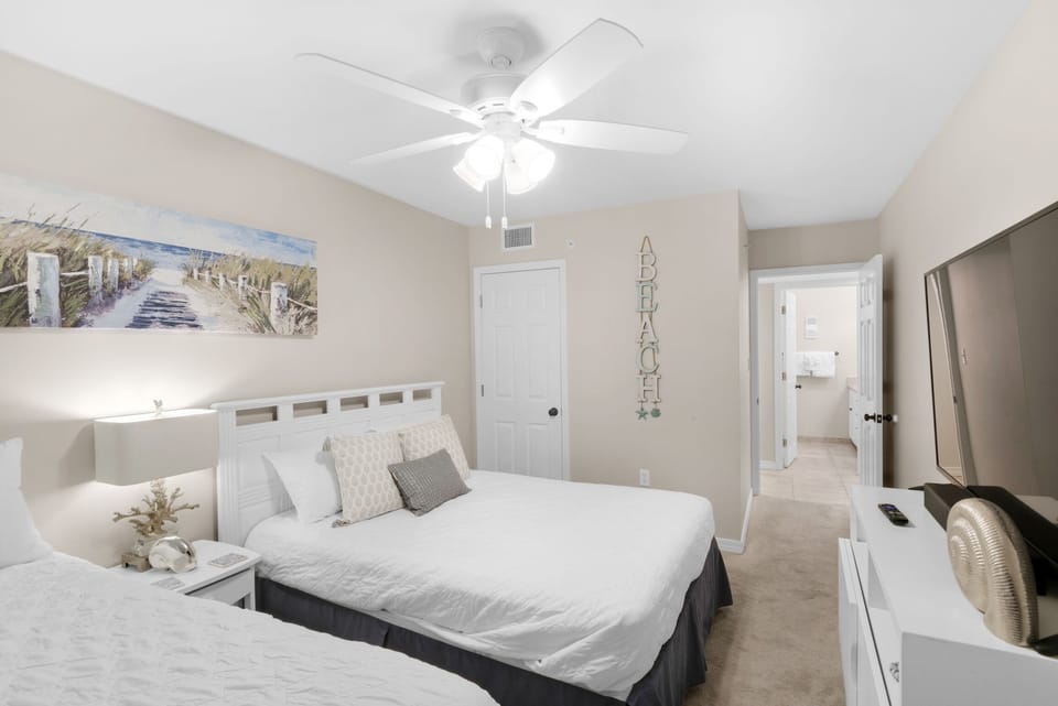 Guest bedroom with large flat screen TV