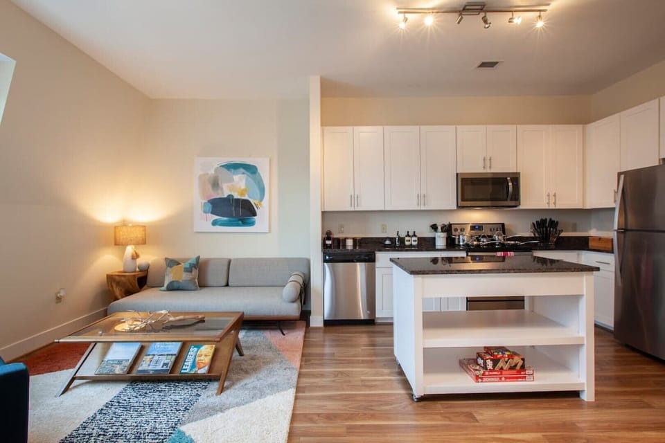 View of the kitchen and living room area as you exit the bedroom.