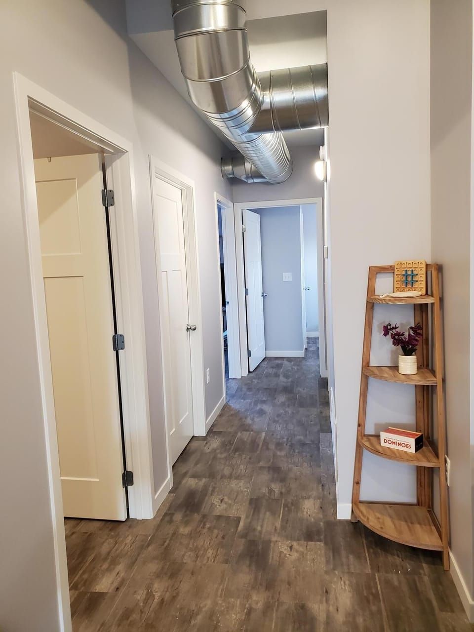 Bathroom, laundry and two bedrooms down the hallway.
