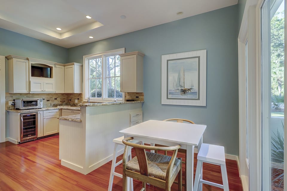 light & bright kitchen with bar height seating 4