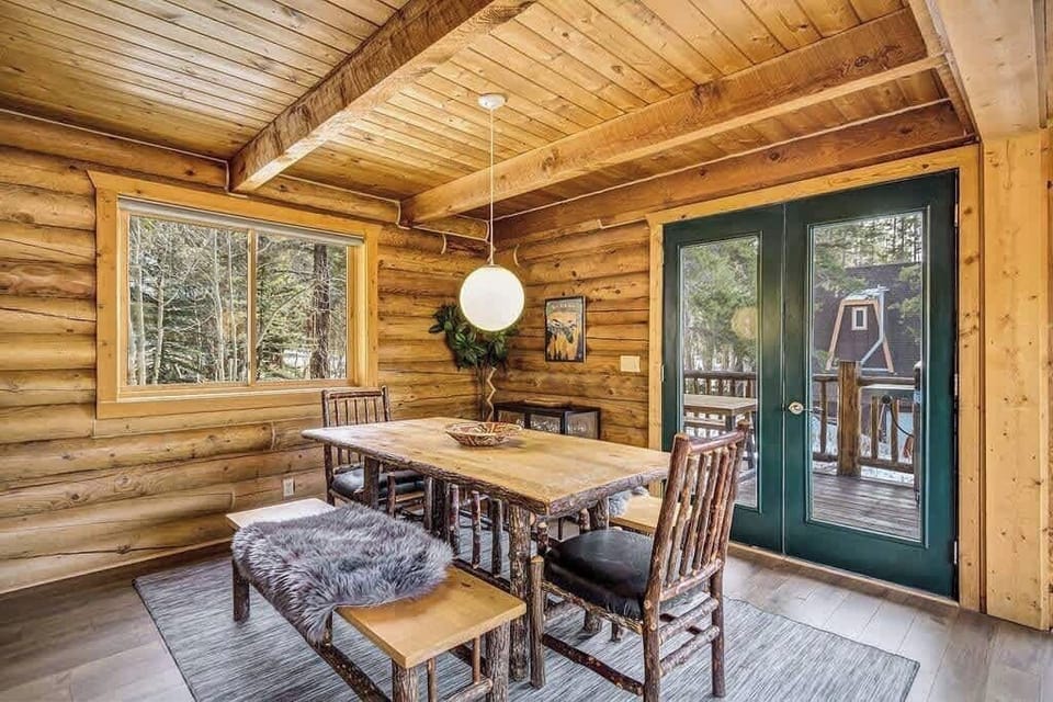 Dining space with chairs and bench seating.
| Blue River Hideaway by Boutiq Luxury Vacation Rentals | Breckenridge, Colorado