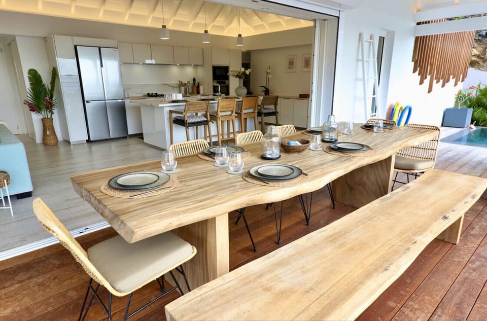 Outdoor table for your meals with a view of the Caribbean Sea.