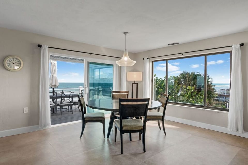 Main Level Dining Area off of Kitchen and Couch Sitting Area