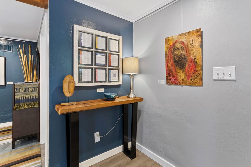 Welcome to Belhaven Arts Hideaway. Original window has guest suite & area info.