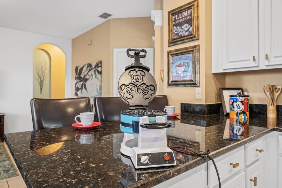 Mickey & Minnie Waffle Maker & Mickey Cookie Jar are special details.