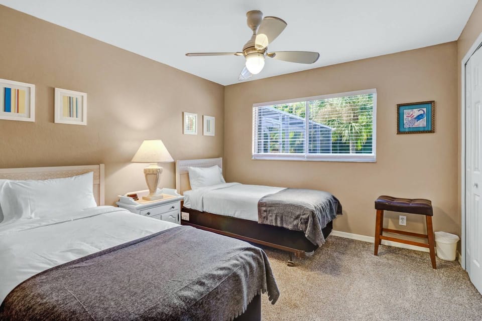 A 3rd bedroom features 2 twin beds.