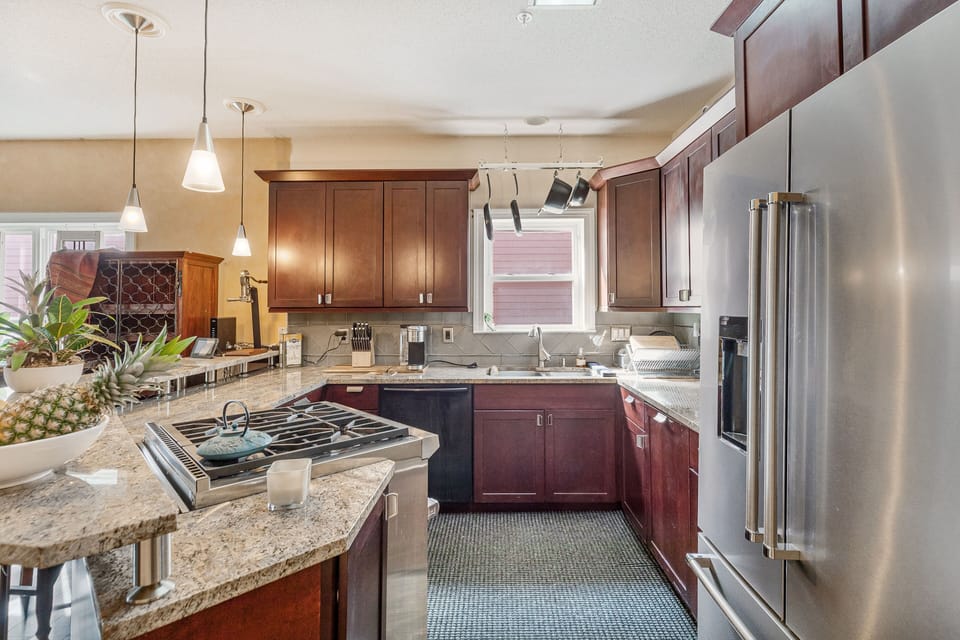 custom cabinetry, Wolf pro gas range/convection oven, KitchenAid Pro series frig