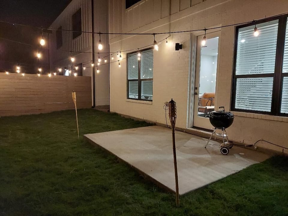 Outdoor patio with Weber grill; match light charcoal, lighter, utensils included