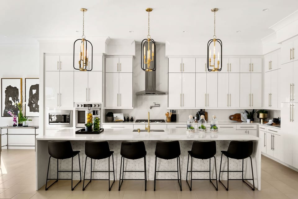 The kitchen breakfast bar has seating for 6