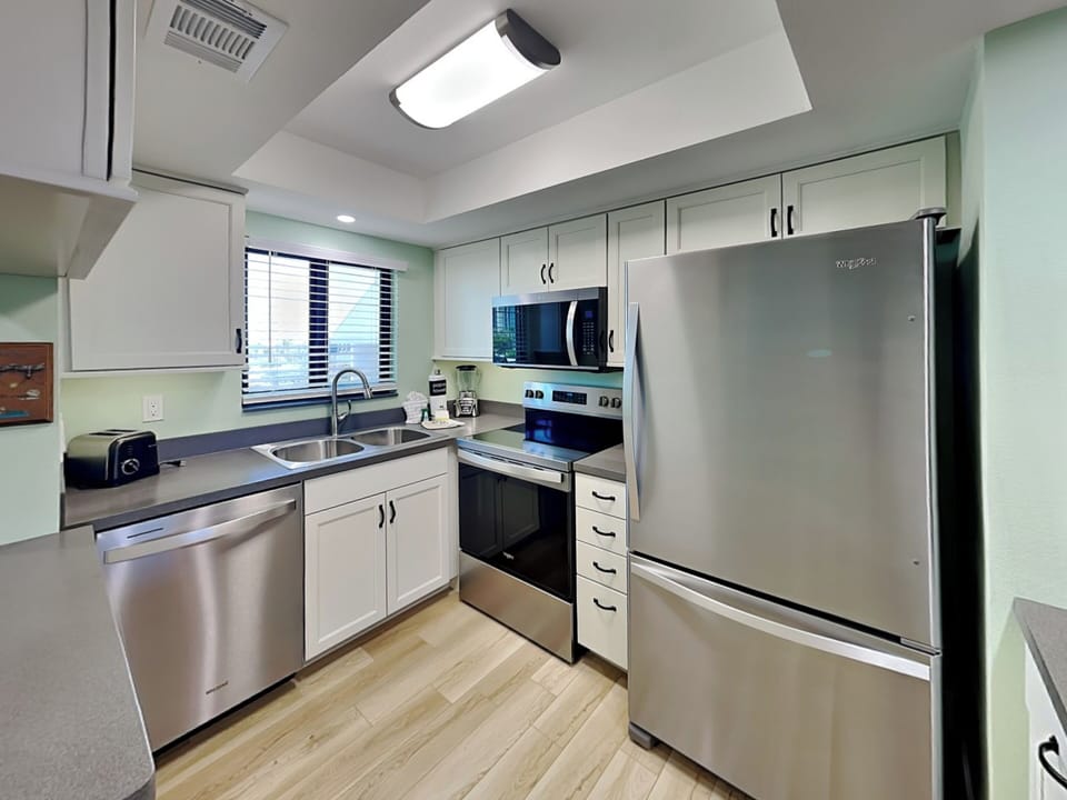 Fully Equipped Kitchen with Stainless Steel Appliances