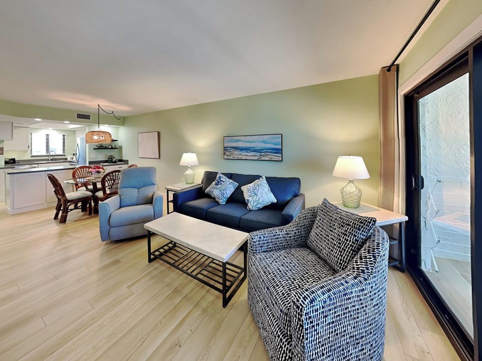 Living Room with Gulf Views + Private Balcony Access