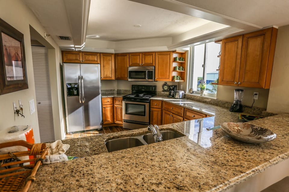 Fully Equipped Kitchen with Stainless Steel Appliances