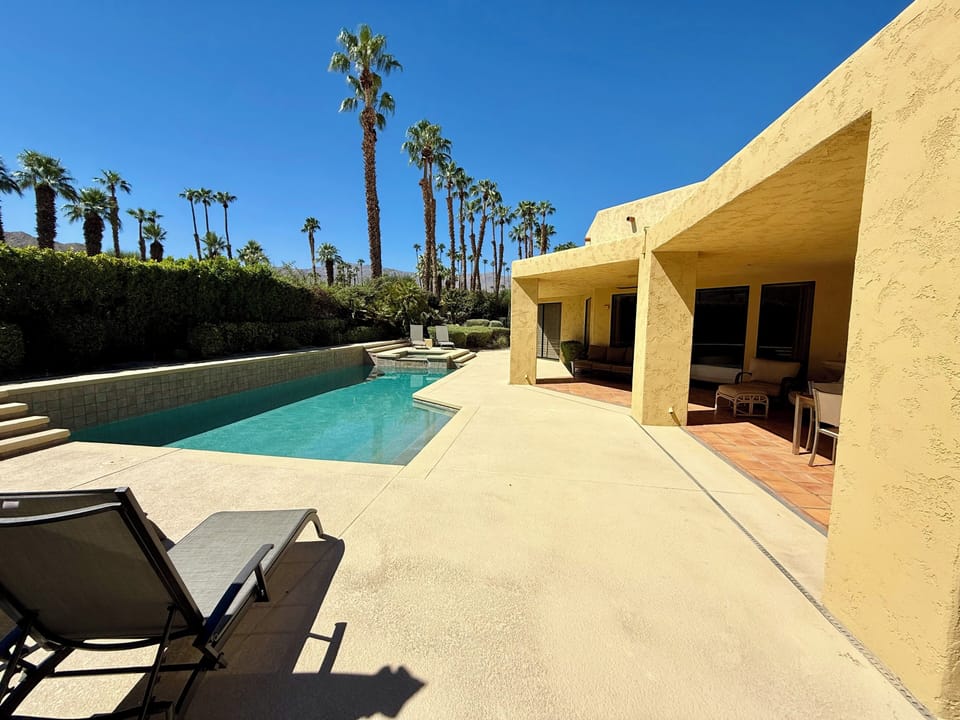 Newly resurfaced Pebbletech pool and Marbelite pool decking