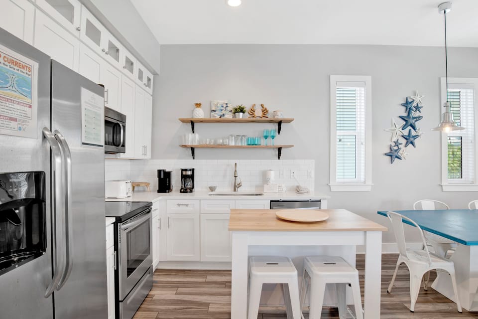 The kitchen if fully equipped and has seating for 2 at the kitchen island