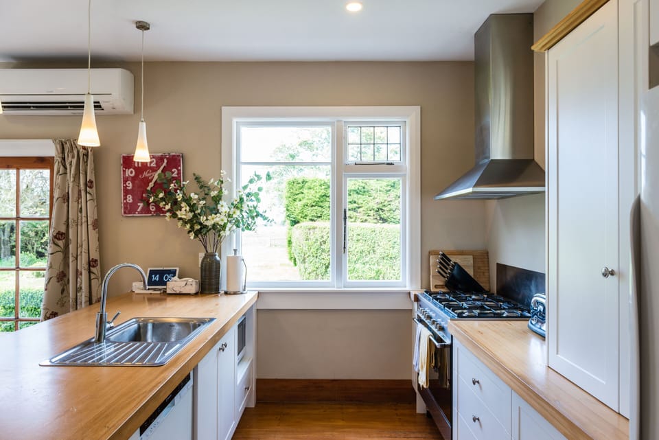 Kitchen with gas hob, electric oven microwave and other appliances