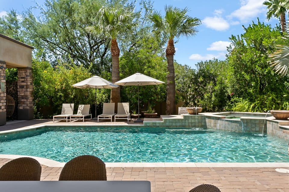 Enjoy the uxurious private pool and hot tub with spillway