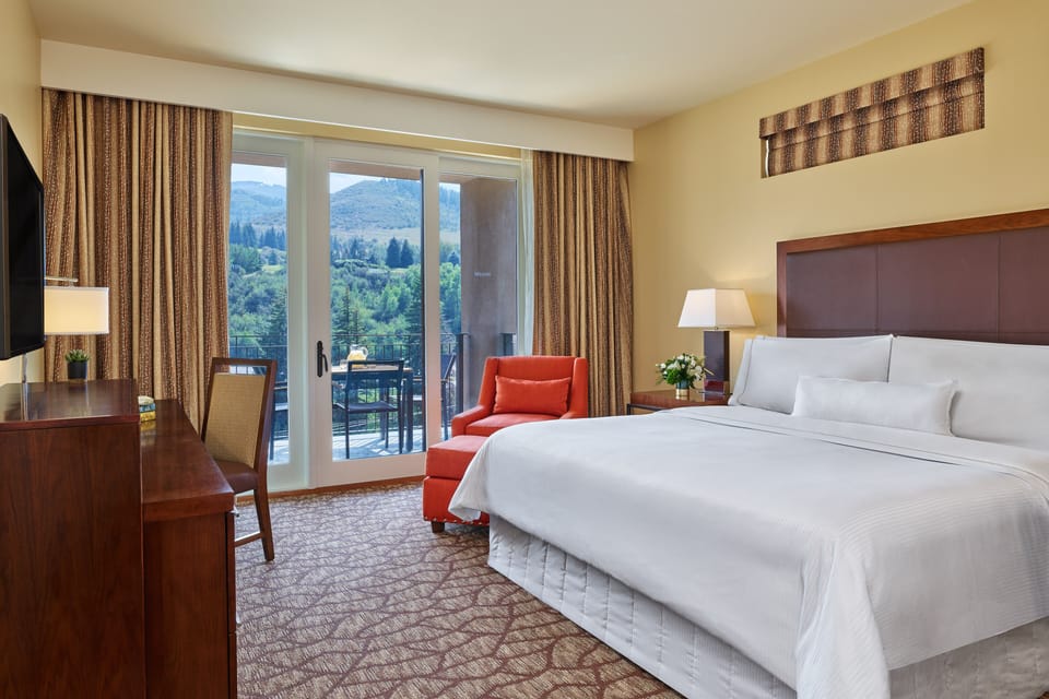 Spacious bedroom with king size heavenly bed.