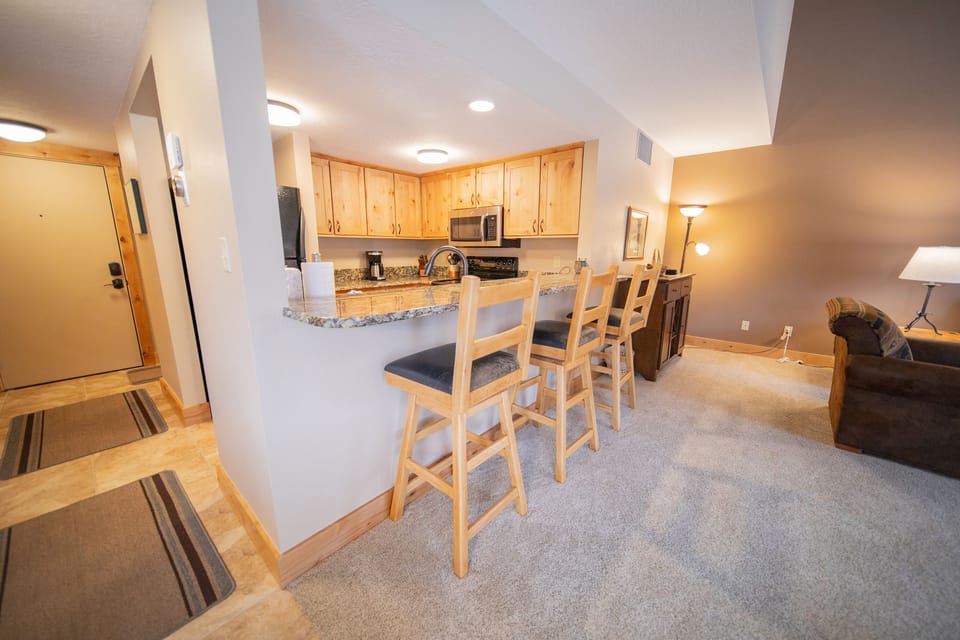 Extra seating at the bar to keep the cook company