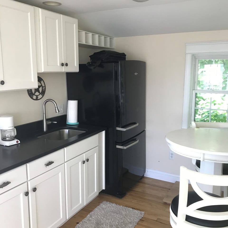 3rd Floor Sitting Area with Large Refrigerator and Sink