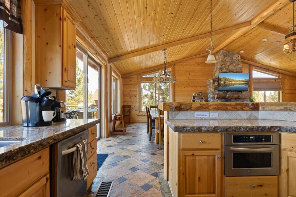 Imagine waking up here to make breakfast!  Granite counters and stainless steel appliances.