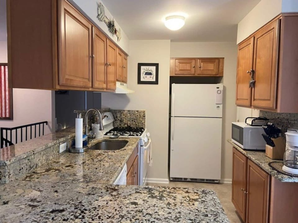 Fully equipped kitchen with all appliances, pots/pans, dishes, microwave, Keurig