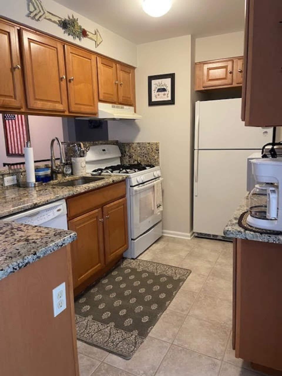 Kitchen view. Plenty of counter and cabinet space for meal prep and clean up. 