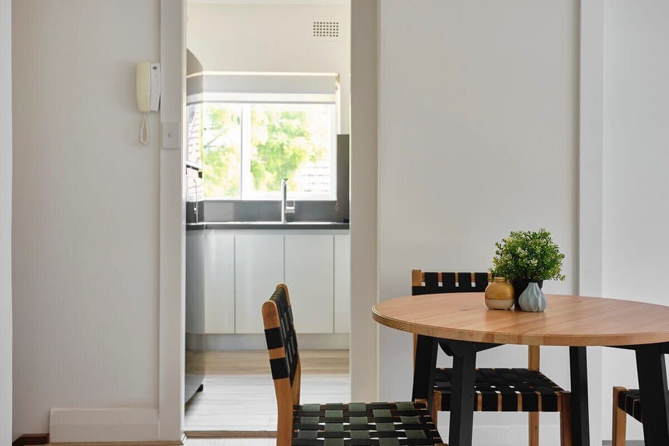 Dining set up looking onto the kitchen