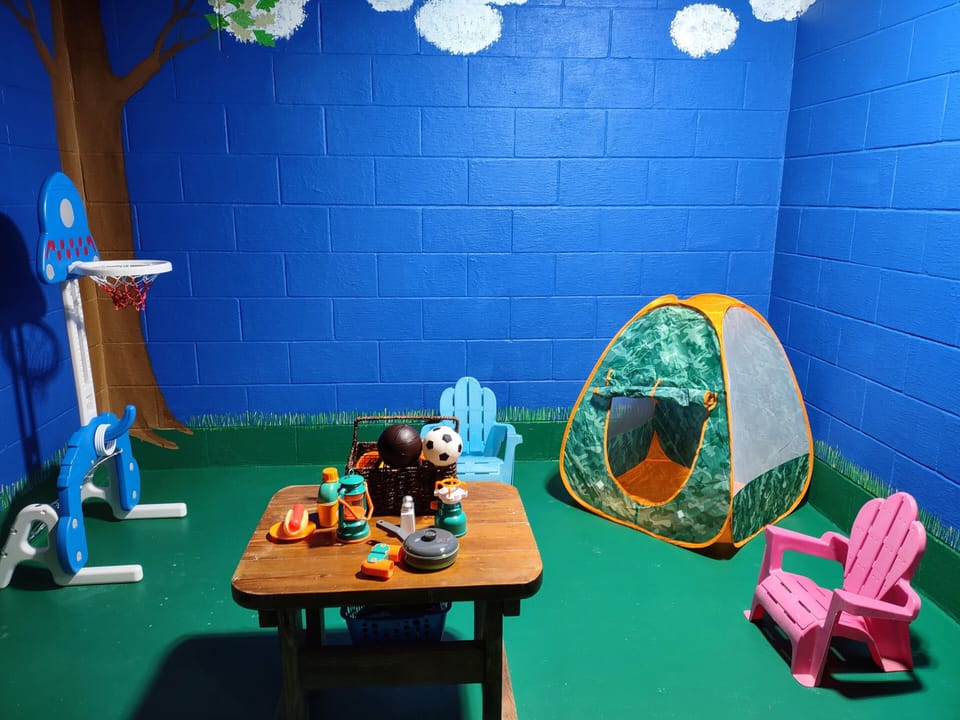 Indoor camping play area for toddlers.