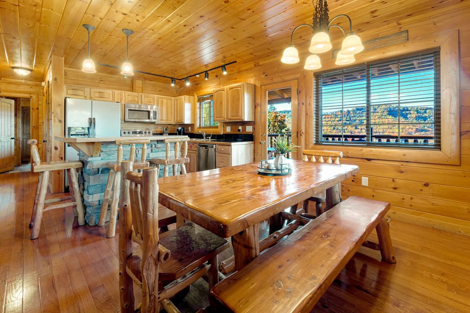 Enjoy the view out both windows from the natural slab farmhouse table!