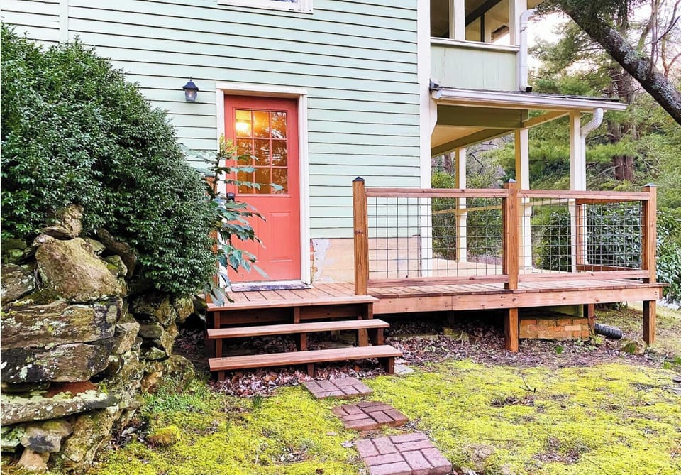 Entrance into the downstairs. Also leads to back porch with grill. 