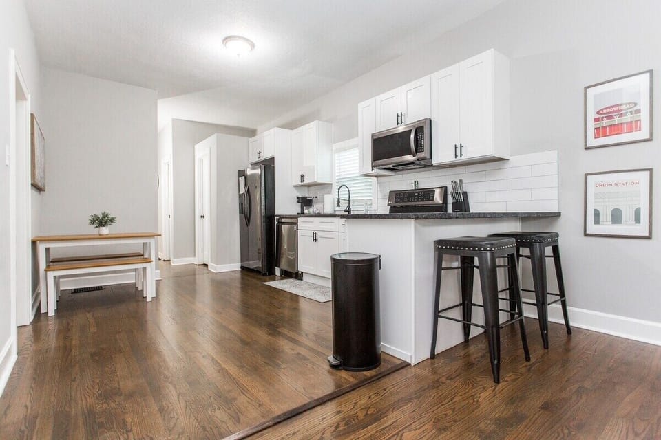 Kitchen seating, bar seating, open kitchen with stainless steel appliances!