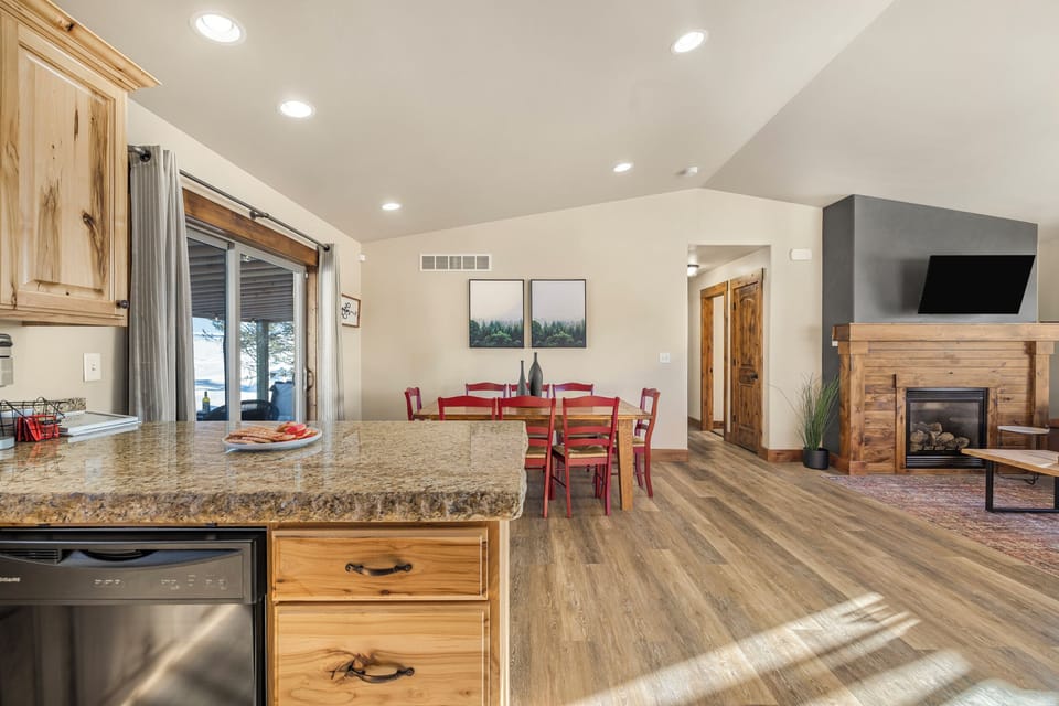 Dining table extends to seat 8 people, 3 bar stools at the counter and then coffee table space for the little ones. High chair available but not pictured.