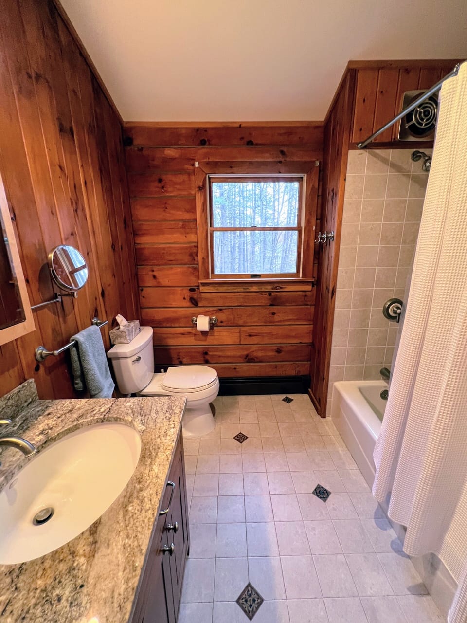 Full bathroom with tub upstairs.