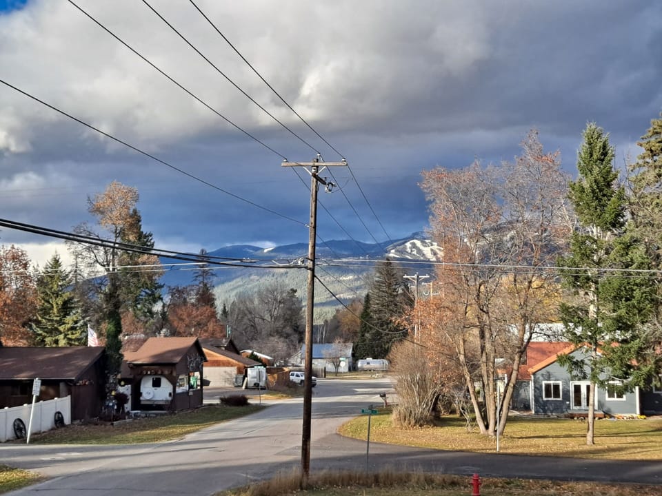 Check out the snow on the mountain from your front deck 