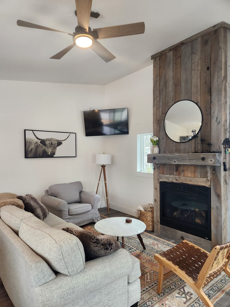 Comfortable open living room with gas fireplace 