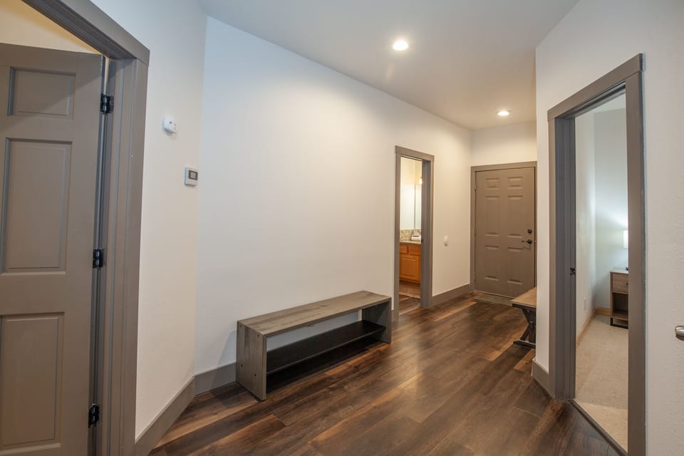 Lower floor hallway with ample room for your gear.