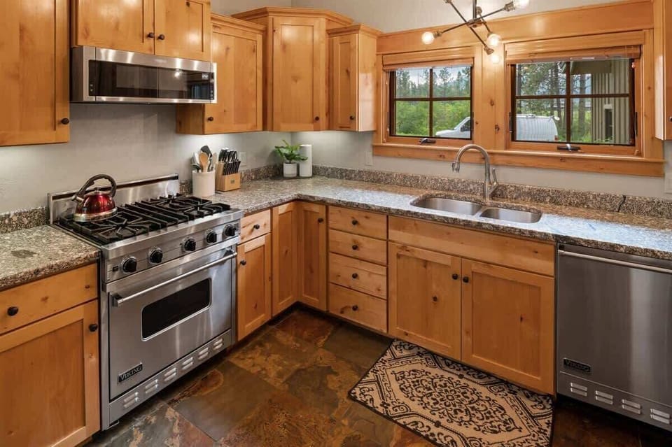 Kitchen is fully appointed with a gas range.