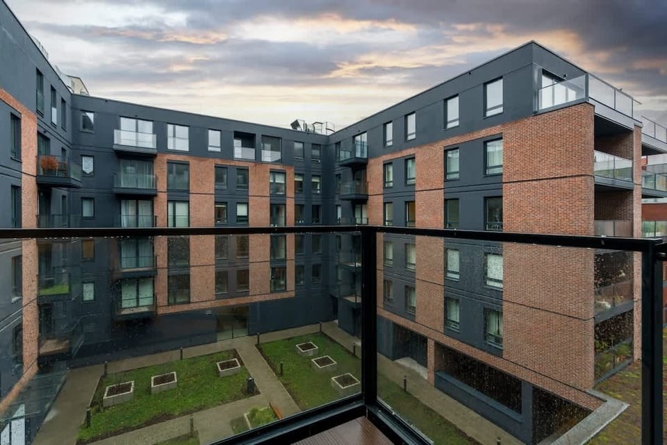 The balcony provides a perfect spot for enjoying the fresh air. 