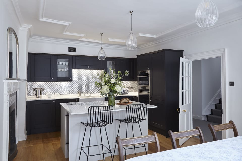 a fully equipped kitchen including wine chillers, dishwasher & washing machine