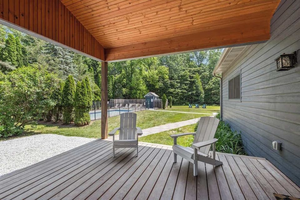 The covered porch is a wonderful place to escape with your morning cup of coffee.