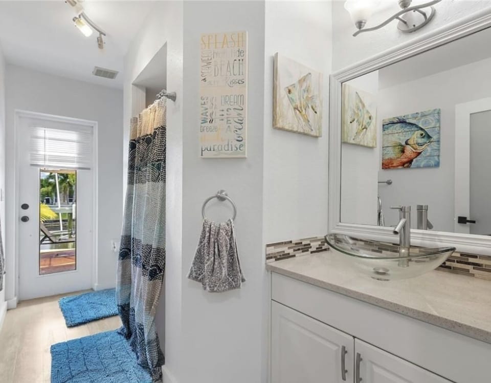Guest bedroom with individual Exit to the backyard pool area.