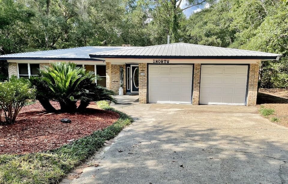 Ample parking in driveway for 4+ vehicles & street parking