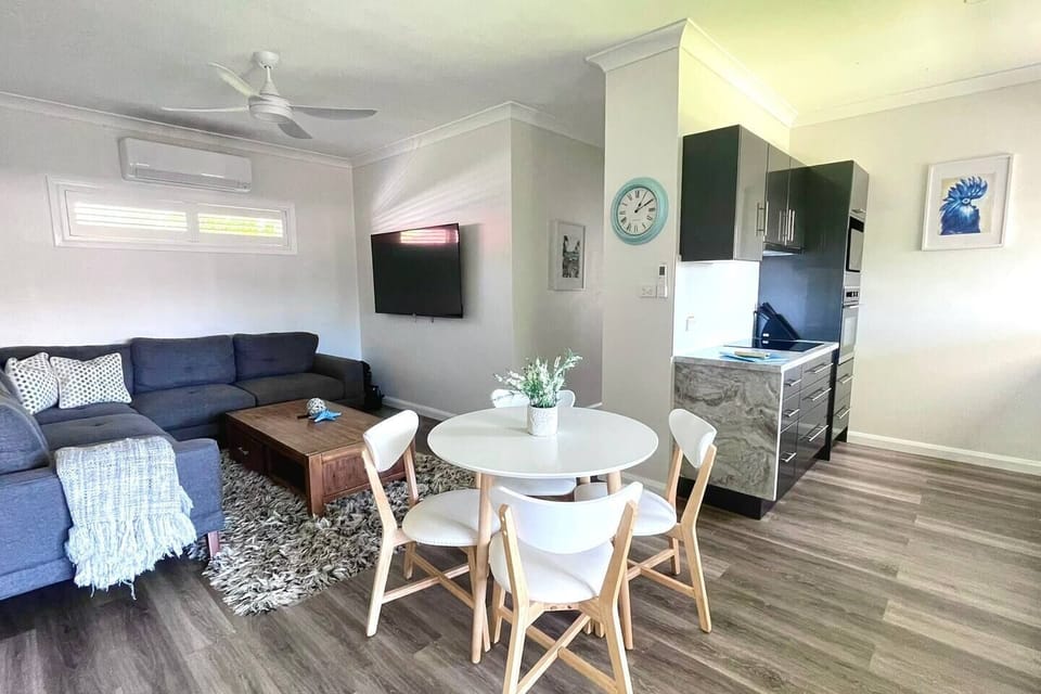 Fully Equipped Kitchen with own Patio and yard to the side of the house.  Quiet separate area to work from home ( if you need ) while the rest of the family enjoys their holiday in the back are of the house