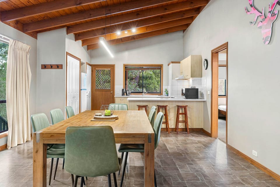 Dining area accommodates up to 8 guests comfortably.