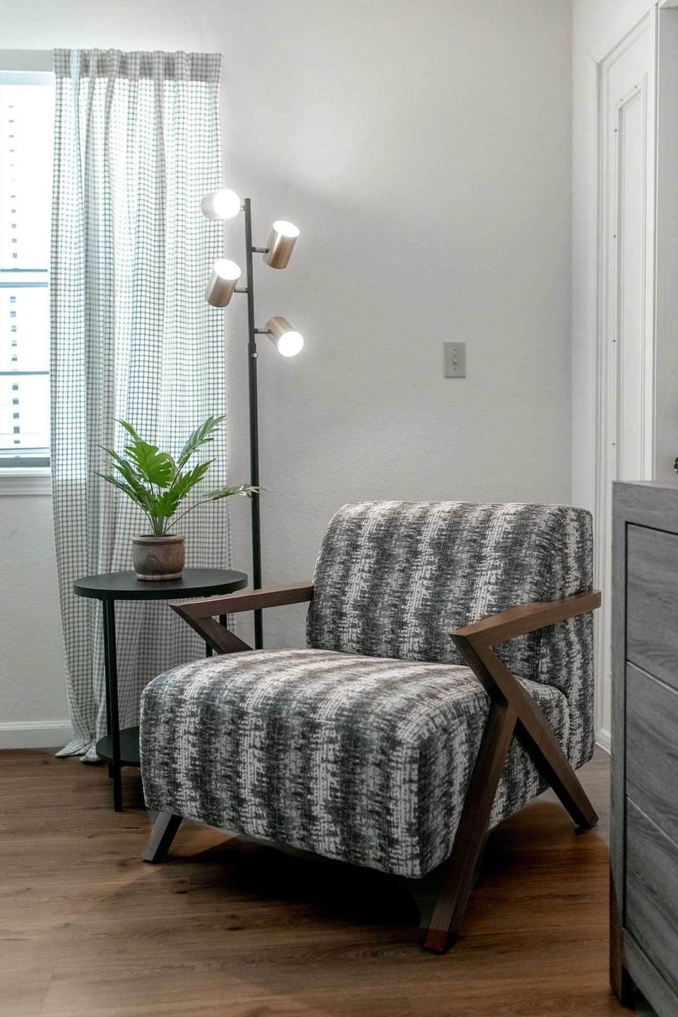 This additional seating in the bedroom makes for a great place to read.