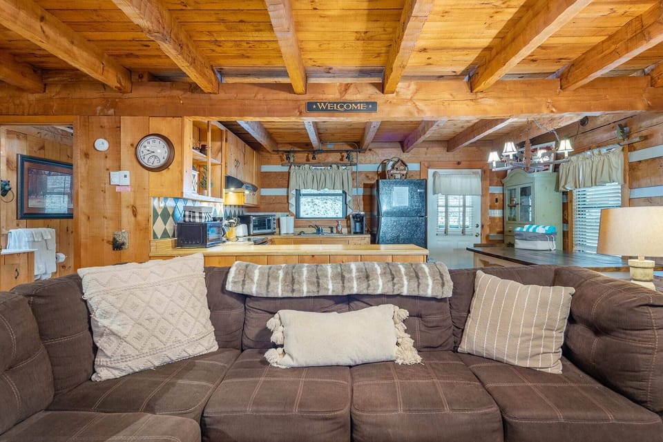 Cozy Living Room w/ cable tv to watch the games, board games to entertain, and comfy seating!