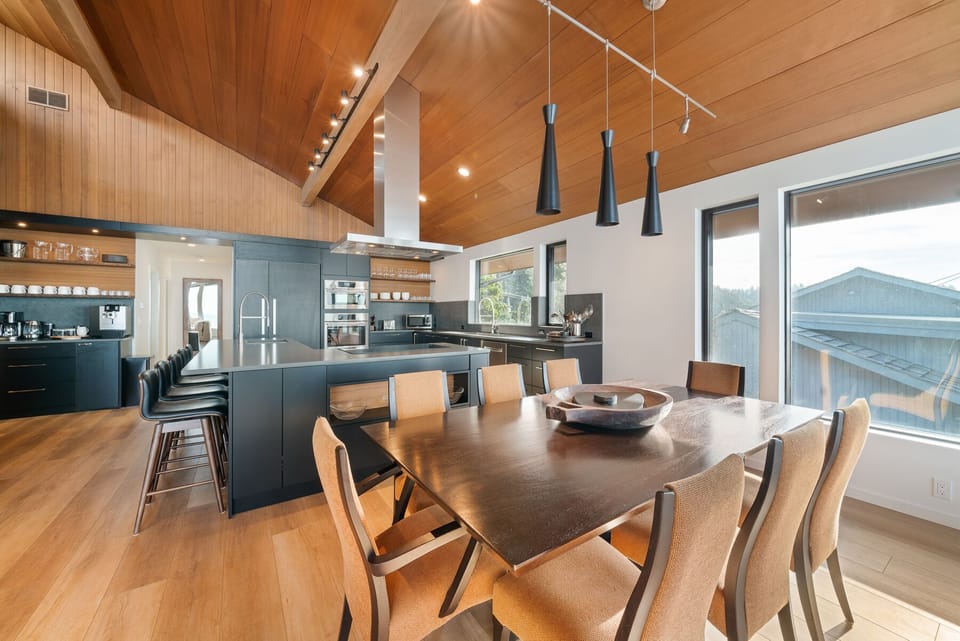 5 comfy bar stools @ kitchen counter; plus a separate coffee bar w/ ice-machine